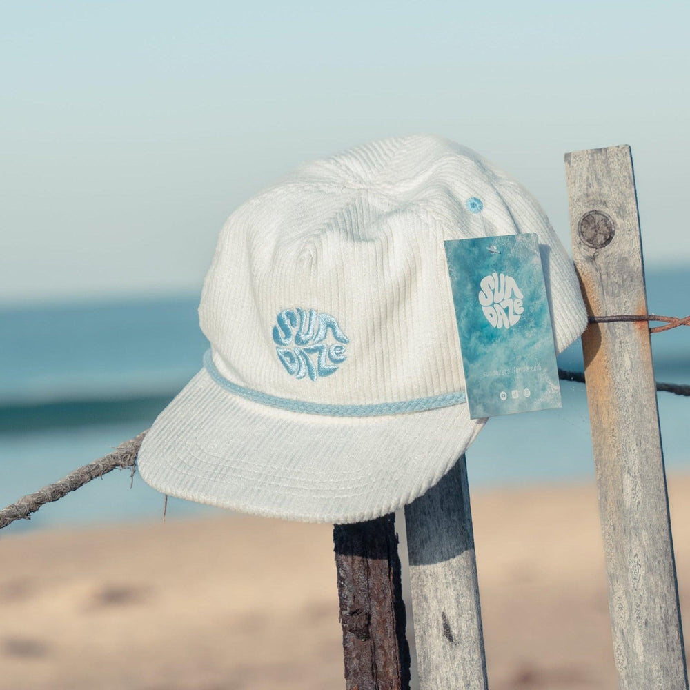 white corduroy hat